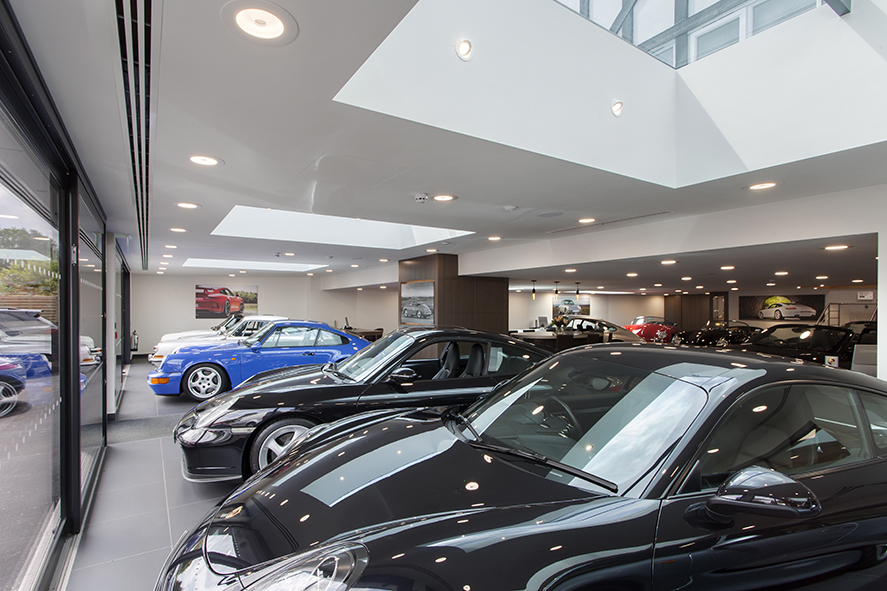 Paragon Porsche main foyer with Illuma Spira LED and Twizzle LED downlights, East Sussex, UK
